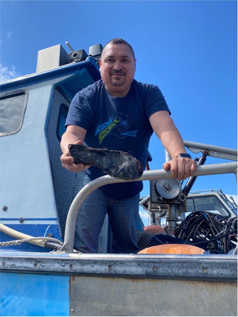 Chris Tom found this old work boot geoduck diving off Port Gamble