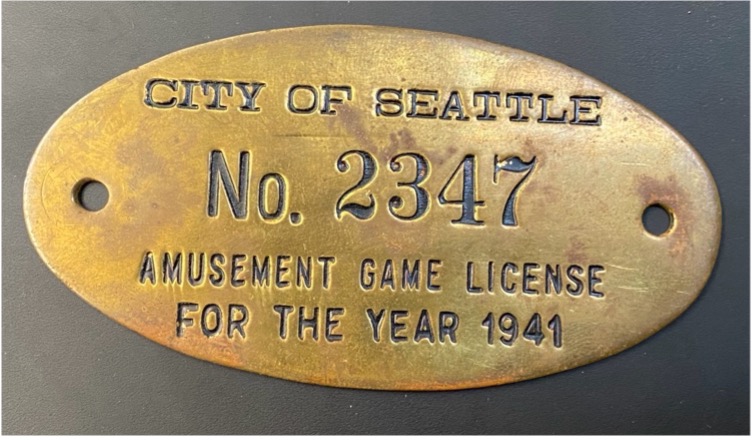Crime followed the lucrative jukebox and pinball machine business, prompting Seattle to license and regulate their use