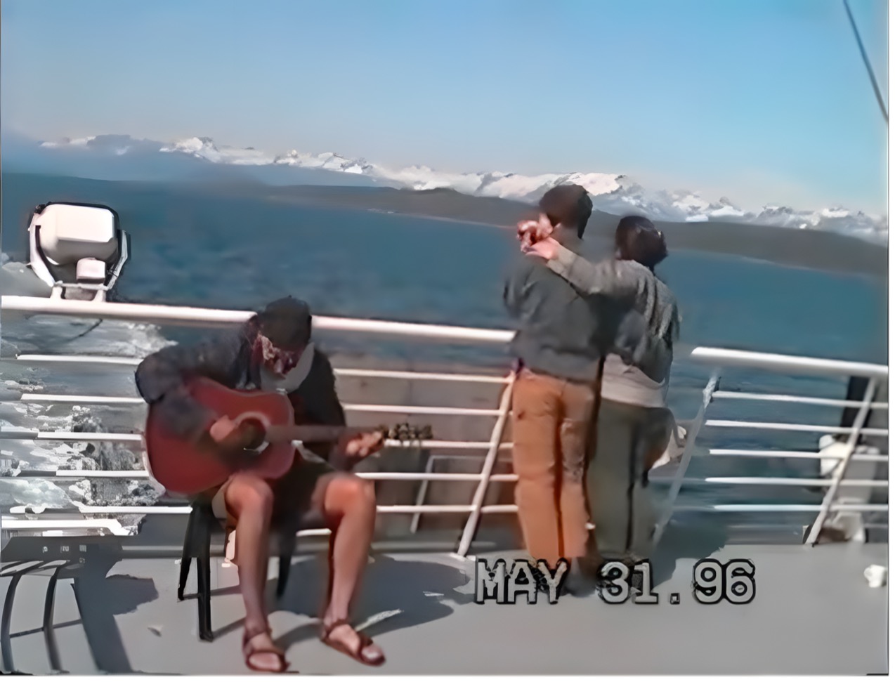 Guy playing guitar on way to Hoonah and The Farm